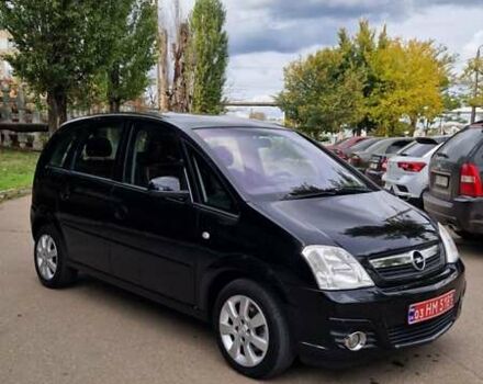 Черный Опель Мерива, объемом двигателя 1.6 л и пробегом 245 тыс. км за 5500 $, фото 1 на Automoto.ua