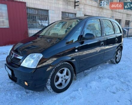 Черный Опель Мерива, объемом двигателя 1.6 л и пробегом 250 тыс. км за 3500 $, фото 1 на Automoto.ua