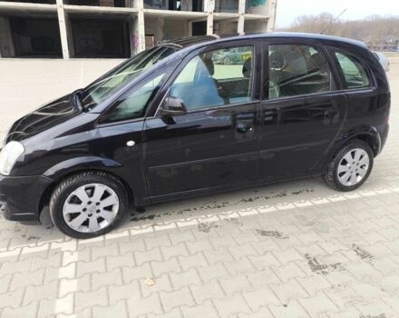 Черный Опель Мерива, объемом двигателя 1.7 л и пробегом 240 тыс. км за 3900 $, фото 1 на Automoto.ua