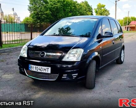 Черный Опель Мерива, объемом двигателя 1.6 л и пробегом 310 тыс. км за 3500 $, фото 1 на Automoto.ua