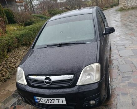 Черный Опель Мерива, объемом двигателя 1.6 л и пробегом 204 тыс. км за 3800 $, фото 1 на Automoto.ua