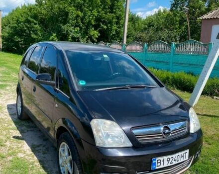 Черный Опель Мерива, объемом двигателя 1.6 л и пробегом 300 тыс. км за 3696 $, фото 1 на Automoto.ua