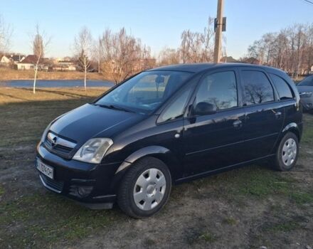 Черный Опель Мерива, объемом двигателя 1.36 л и пробегом 286 тыс. км за 4700 $, фото 1 на Automoto.ua