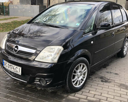 Черный Опель Мерива, объемом двигателя 1.25 л и пробегом 197 тыс. км за 3650 $, фото 1 на Automoto.ua