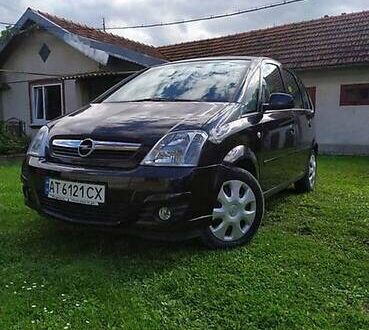 Черный Опель Мерива, объемом двигателя 1.3 л и пробегом 134 тыс. км за 4500 $, фото 1 на Automoto.ua