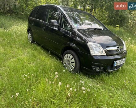 Черный Опель Мерива, объемом двигателя 1.4 л и пробегом 243 тыс. км за 2700 $, фото 1 на Automoto.ua