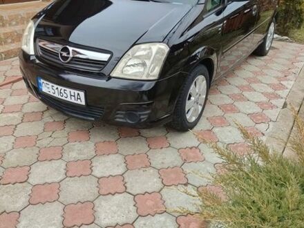 Черный Опель Мерива, объемом двигателя 1.6 л и пробегом 151 тыс. км за 4750 $, фото 1 на Automoto.ua