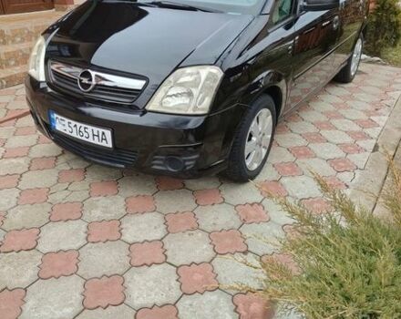Черный Опель Мерива, объемом двигателя 1.6 л и пробегом 151 тыс. км за 4750 $, фото 1 на Automoto.ua