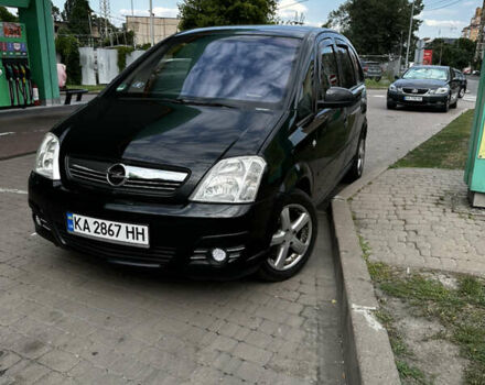 Черный Опель Мерива, объемом двигателя 1.6 л и пробегом 233 тыс. км за 4800 $, фото 1 на Automoto.ua
