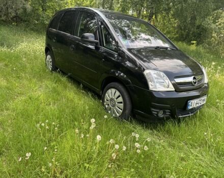 Черный Опель Мерива, объемом двигателя 1.4 л и пробегом 242 тыс. км за 2800 $, фото 1 на Automoto.ua