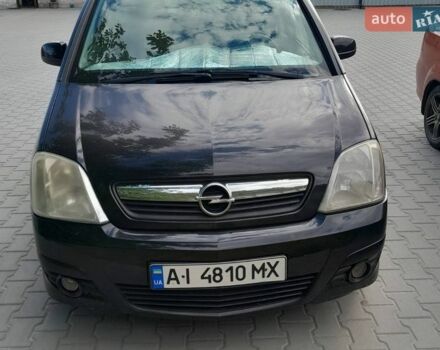 Черный Опель Мерива, объемом двигателя 1.6 л и пробегом 198 тыс. км за 4700 $, фото 1 на Automoto.ua