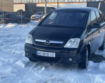 Черный Опель Мерива, объемом двигателя 1.6 л и пробегом 227 тыс. км за 4200 $, фото 1 на Automoto.ua