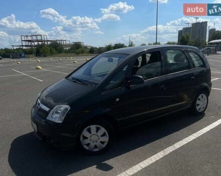 Черный Опель Мерива, объемом двигателя 1.6 л и пробегом 170 тыс. км за 5000 $, фото 1 на Automoto.ua