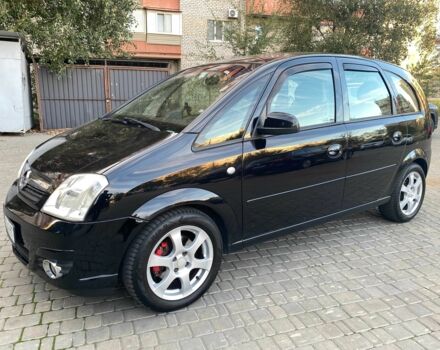 Черный Опель Мерива, объемом двигателя 1.8 л и пробегом 260 тыс. км за 5800 $, фото 1 на Automoto.ua