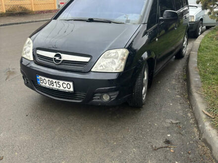 Черный Опель Мерива, объемом двигателя 1.6 л и пробегом 158 тыс. км за 4500 $, фото 1 на Automoto.ua
