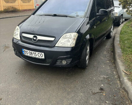 Черный Опель Мерива, объемом двигателя 1.6 л и пробегом 158 тыс. км за 4500 $, фото 1 на Automoto.ua