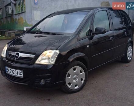 Черный Опель Мерива, объемом двигателя 1.6 л и пробегом 177 тыс. км за 4899 $, фото 1 на Automoto.ua