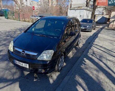 Черный Опель Мерива, объемом двигателя 1.7 л и пробегом 222 тыс. км за 4450 $, фото 1 на Automoto.ua