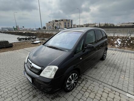 Черный Опель Мерива, объемом двигателя 1.8 л и пробегом 137 тыс. км за 4650 $, фото 1 на Automoto.ua