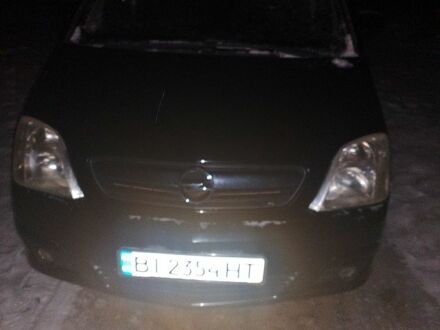 Черный Опель Мерива, объемом двигателя 1.2 л и пробегом 22400 тыс. км за 5000 $, фото 1 на Automoto.ua