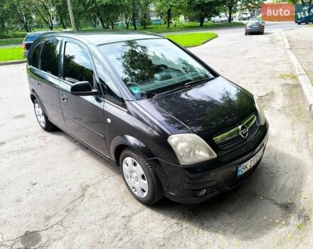 Черный Опель Мерива, объемом двигателя 1.6 л и пробегом 223 тыс. км за 4600 $, фото 1 на Automoto.ua