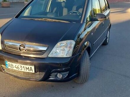 Черный Опель Мерива, объемом двигателя 1.6 л и пробегом 285 тыс. км за 4400 $, фото 1 на Automoto.ua