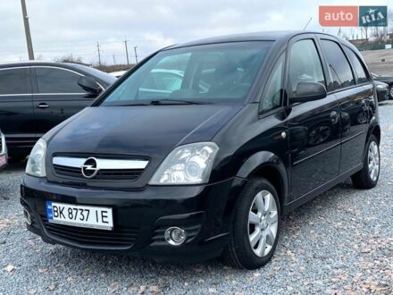 Черный Опель Мерива, объемом двигателя 1.6 л и пробегом 218 тыс. км за 4850 $, фото 1 на Automoto.ua