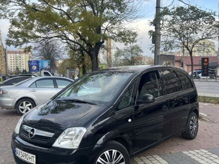 Черный Опель Мерива, объемом двигателя 1.6 л и пробегом 250 тыс. км за 4199 $, фото 1 на Automoto.ua