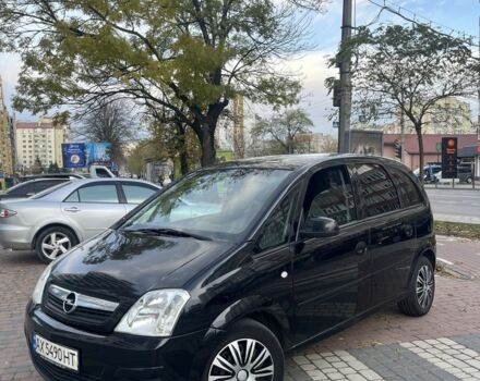Черный Опель Мерива, объемом двигателя 1.6 л и пробегом 250 тыс. км за 4199 $, фото 1 на Automoto.ua