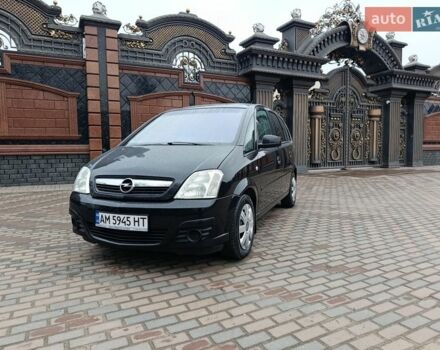 Черный Опель Мерива, объемом двигателя 1.6 л и пробегом 237 тыс. км за 4399 $, фото 1 на Automoto.ua