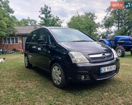 Черный Опель Мерива, объемом двигателя 1.6 л и пробегом 150 тыс. км за 4300 $, фото 1 на Automoto.ua
