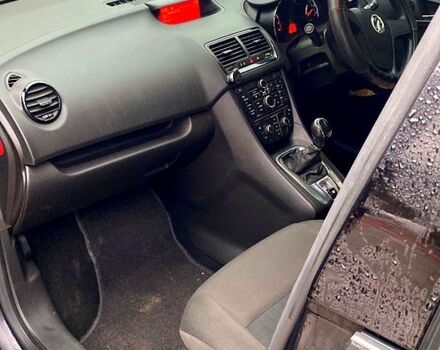 Черный Опель Мерива, объемом двигателя 1.4 л и пробегом 150 тыс. км за 3000 $, фото 1 на Automoto.ua