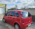 Красный Опель Мерива, объемом двигателя 1.7 л и пробегом 300 тыс. км за 2700 $, фото 1 на Automoto.ua