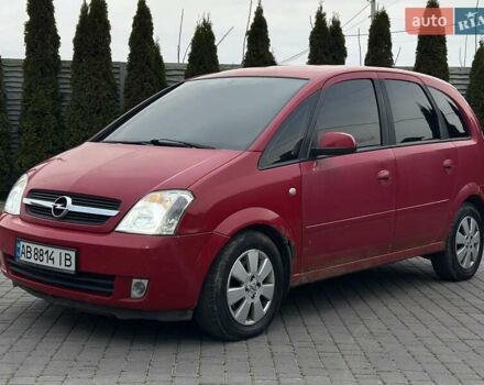 Красный Опель Мерива, объемом двигателя 1.6 л и пробегом 274 тыс. км за 2550 $, фото 1 на Automoto.ua