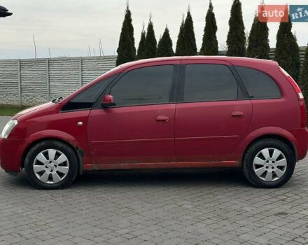 Красный Опель Мерива, объемом двигателя 1.6 л и пробегом 274 тыс. км за 2550 $, фото 2 на Automoto.ua