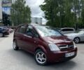Красный Опель Мерива, объемом двигателя 1.7 л и пробегом 355 тыс. км за 3499 $, фото 1 на Automoto.ua