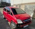 Червоний Опель Меріва, об'ємом двигуна 1.7 л та пробігом 300 тис. км за 2700 $, фото 1 на Automoto.ua