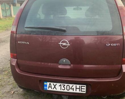 Красный Опель Мерива, объемом двигателя 1.7 л и пробегом 218 тыс. км за 3300 $, фото 3 на Automoto.ua