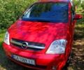 Красный Опель Мерива, объемом двигателя 1.6 л и пробегом 211 тыс. км за 4200 $, фото 1 на Automoto.ua