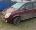 Красный Опель Мерива, объемом двигателя 1.7 л и пробегом 218 тыс. км за 3300 $, фото 2 на Automoto.ua
