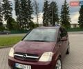 Красный Опель Мерива, объемом двигателя 1.6 л и пробегом 241 тыс. км за 3850 $, фото 1 на Automoto.ua