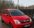 Красный Опель Мерива, объемом двигателя 1.6 л и пробегом 229 тыс. км за 4300 $, фото 1 на Automoto.ua