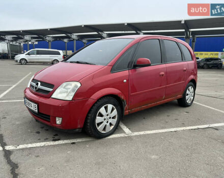 Красный Опель Мерива, объемом двигателя 1.6 л и пробегом 268 тыс. км за 2500 $, фото 1 на Automoto.ua