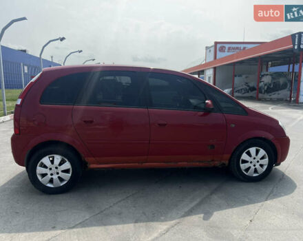 Красный Опель Мерива, объемом двигателя 1.6 л и пробегом 272 тыс. км за 2000 $, фото 6 на Automoto.ua