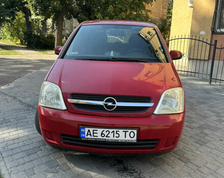 Красный Опель Мерива, объемом двигателя 1.6 л и пробегом 215 тыс. км за 3600 $, фото 1 на Automoto.ua