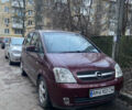 Красный Опель Мерива, объемом двигателя 1.6 л и пробегом 236 тыс. км за 4800 $, фото 2 на Automoto.ua