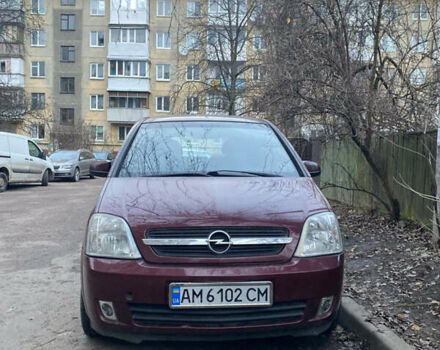 Красный Опель Мерива, объемом двигателя 1.6 л и пробегом 236 тыс. км за 4800 $, фото 1 на Automoto.ua