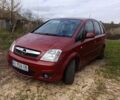 Красный Опель Мерива, объемом двигателя 1.36 л и пробегом 255 тыс. км за 3500 $, фото 2 на Automoto.ua