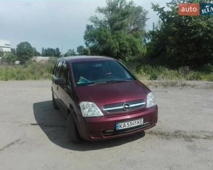 Красный Опель Мерива, объемом двигателя 1.6 л и пробегом 214 тыс. км за 4500 $, фото 1 на Automoto.ua