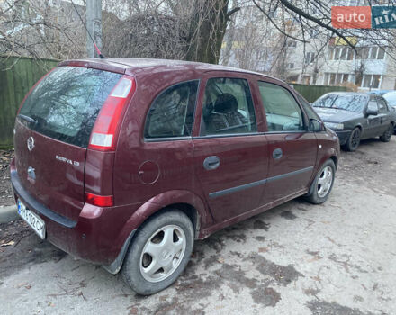 Красный Опель Мерива, объемом двигателя 1.6 л и пробегом 236 тыс. км за 4800 $, фото 6 на Automoto.ua